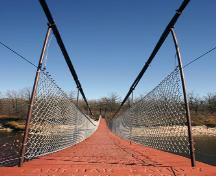Main view across the Senkiw School Suspension Bridge, Roseau River area, 2006; Historic Resources Branch, Manitoba Culture, Heritage and Tourism, 2006