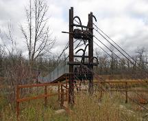 Detail view of the main tower, from the northwest, of the Senkiw School Suspension Bridge, Roseau River area, 2006; Historic Resources Branch, Manitoba Culture, Heritage and Tourism, 2006