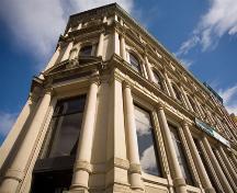 View of the corner entrance to the building.; Commercial Properties Limited