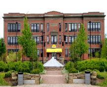 This south view of the Centre Culturel Aberdeen shows the placement of the building at the north end of the Parc du Sommet Park.; Moncton Museum