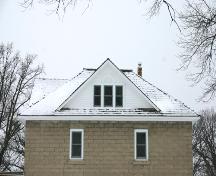 Detail view of the concrete block walls and roof of the Presbyterian Church Manse, Emerson, 2006; Historic Resources Branch, Manitoba Culture, Heritage, Tourism and Sport, 2006