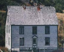 View of front facade Pye House before restoration, Cape St. Charles, Labrador, 1998.; HFNL 2005