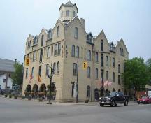 Of note are the steeply pitched gabled roof, multiple dormers and octagonal tower.; Kayla Jonas, 2007.