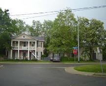 Of note are the pedimented portico and plaster and stucco construction.; Kayla Jonas, 2007.