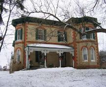 Featured are the side porch and contrasting brick quoining.; County of Brant, Community and Development Services, 2007.