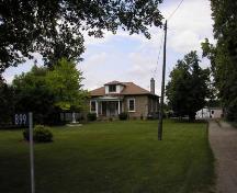 Of note is the hipped roof and dormer window.; County of Brant, Community and Development Services, 2007.