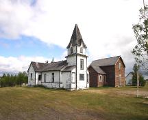 Contextual view, looking north, of the Bethlehem Lutheran Church Manse, (centre), Erickson, 2005; Historic Resources Branch, Manitoba Culture, Heritage, Tourism and Sport, 2005
