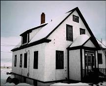 View of front and right facade of Louie A. Hall, Forteau, NL.; Heritage Foundation of Newfoundland and Labrador