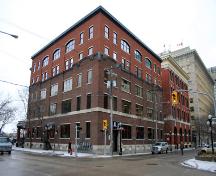 Primary elevations (with original three storey section distinguished from recent two storey addition by brick colour and fenestration), from the northwest, of the Northern Electric Building, Winnipeg, 2007; Historic Resources Branch, Manitoba Culture, Heritage and Tourism, 2007