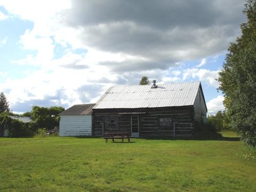 Front and right side view of Gilroy Farm