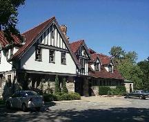 Willistead's 2-1/2-storey coach house complements the
grand manor house with similar external materials (half-timbering, stone, brick and ornate wood ), quality workmanship and design.; City of Windsor, Planning Department