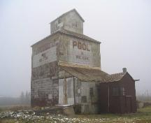 Exterior view following re-roofing, 2005; Government of Saskatchewan, Flaman, 2005.