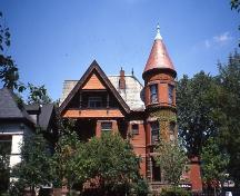 View of the front façade on St. George Street showing tower and third floor verandah – 1999; OHT, 1999