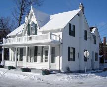 This image captures the symmetry of the windows on this Gothic House, 2007.; Lindsay Benjamin, 2007.