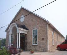 This photo features the cut stone construction and the oculus in the gable, circa 2004.; Township of Centre Wellington