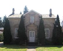 East façade of the Bell-Carlton House depicting the ornate framing of the central doorway.; Lindsay Benjamin, 2007.