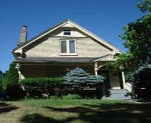 Featured is a Queen Anne Revival style house, typical of the district.; Kendra Green, 2007.