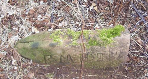 Showing example of carved sandstone marker