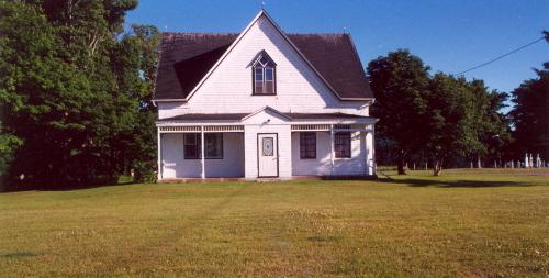 Showing verandah and Gothic window in gable