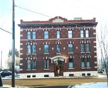 This image illustrates the overall form and massing of the Hecla Block, in its prominent corner location.; City of Edmonton, 2004