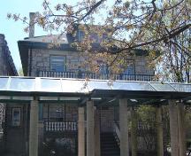 Featured is the stone residence.; Kayla Jonas, 2007.