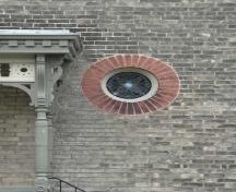 Featured is a circular stained glass window.; Martina Braunstein, 2007.