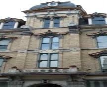 Featured is the central tower flanked by pilasters topped by capitals.; Martina Braunstein, 2007.