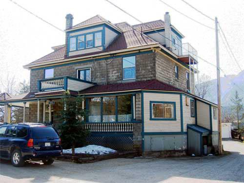 Rear (west) and north elevations, oblique view