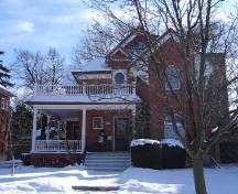Featured is the verandah which supports the second storey balcony with slightly tapered posts, 2007.; Lindsay Benjamin, 2007.