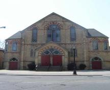 Of note are the polygonal stair towers, the buff-brick and the decorative dichromatic brickwork.; Kendra Green, 2007.