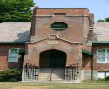 Featured is the projecting tiered buttress and square bell tower.; Ministry of Culture, 2007.