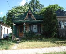 Featured is an Ontario Cottage residence located within the Old East Heritage Conservation District.; Kendra Green, 2007.