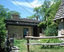 Of note are the 6 over 6 windows surrounded by a simple brick voussoir.; Kendra Green, 2007.