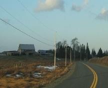 Rooftop visible on approach to Minudie, A.T. Seaman House, Minudie, NS, 2009.; Heritage Division, NS Dept of Tourism, Culture and Heritage, 2009