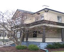 Featured is the wrap around verandah including elegant columns, 2007.; Lindsay Benjamin, 2007.