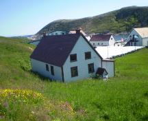 View of rear facade and overlooking Battle Harbour. Photo taken 2008.; HFNL 2008
