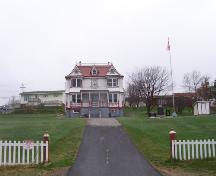 Photo showing view from front grounds of Sunny Cottage, Harbour Breton, NL. Photo taken April 2006.; HFNL 2008