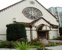 General view of the Church of Our Lord, showing the rose window over the entry porch, 2008.; Parks Canada Agency / Agence Parcs Canada, 2008.