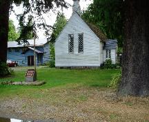 View of the exterior of Christ Church, showing the separate side entrance porch with a Gothic style side entry, 2008.; Parks Canada Agency / Agence Parcs Canada, 2008.