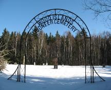 Showing metal entrance gate with sign; PEI Genealogical Society, 2008