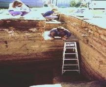 Open excavation unit showing stratified occupation layers.; Government of Saskatchewan.