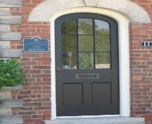 Featured is the front door with radiating voussoir.; Beatrice Tam, 2008.