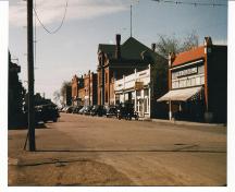 Archival view showing the early quality and condition of the west side of the Historic Downtown Carberry heritage district, Carberry, ca. 1944.; Historic Resources Branch, Manitoba Culture, Heritage, Tourism and Sport, 2008