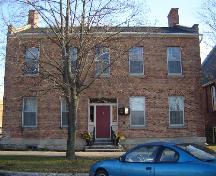 Of note is the central entrance with sidelights and transom.; Kayla Jonas, 2008.