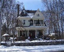 Of note are the conical tower, veranda and balcony.; Paul Dubniak, 2008.