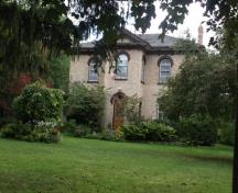 Of note are the round arched windows with ornate drip mould.; Kayla Jonas, 2008.