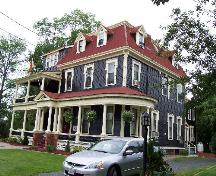 230 University Avenue (Carriage House Inn) side view showing the veranda and the extension to the original structure; City of Fredericton