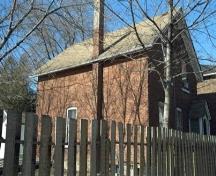 Of note is the tall red brick chimney.; Town of Milton, 2008.