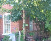 Of note are the 9 over 9 windows with heavy wood sill.; Kirsten Pries, 2008.