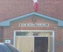 Featured is the front entrance protected by a vestibule.; Kirsten Pries, 2008.